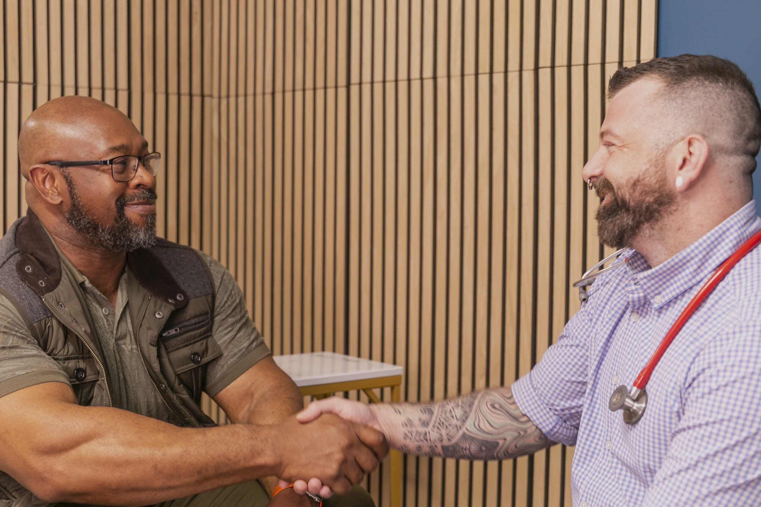 Be Well Medical Group 10 Healthcare provider shaking hands with a patient during a Suboxone treatment visit