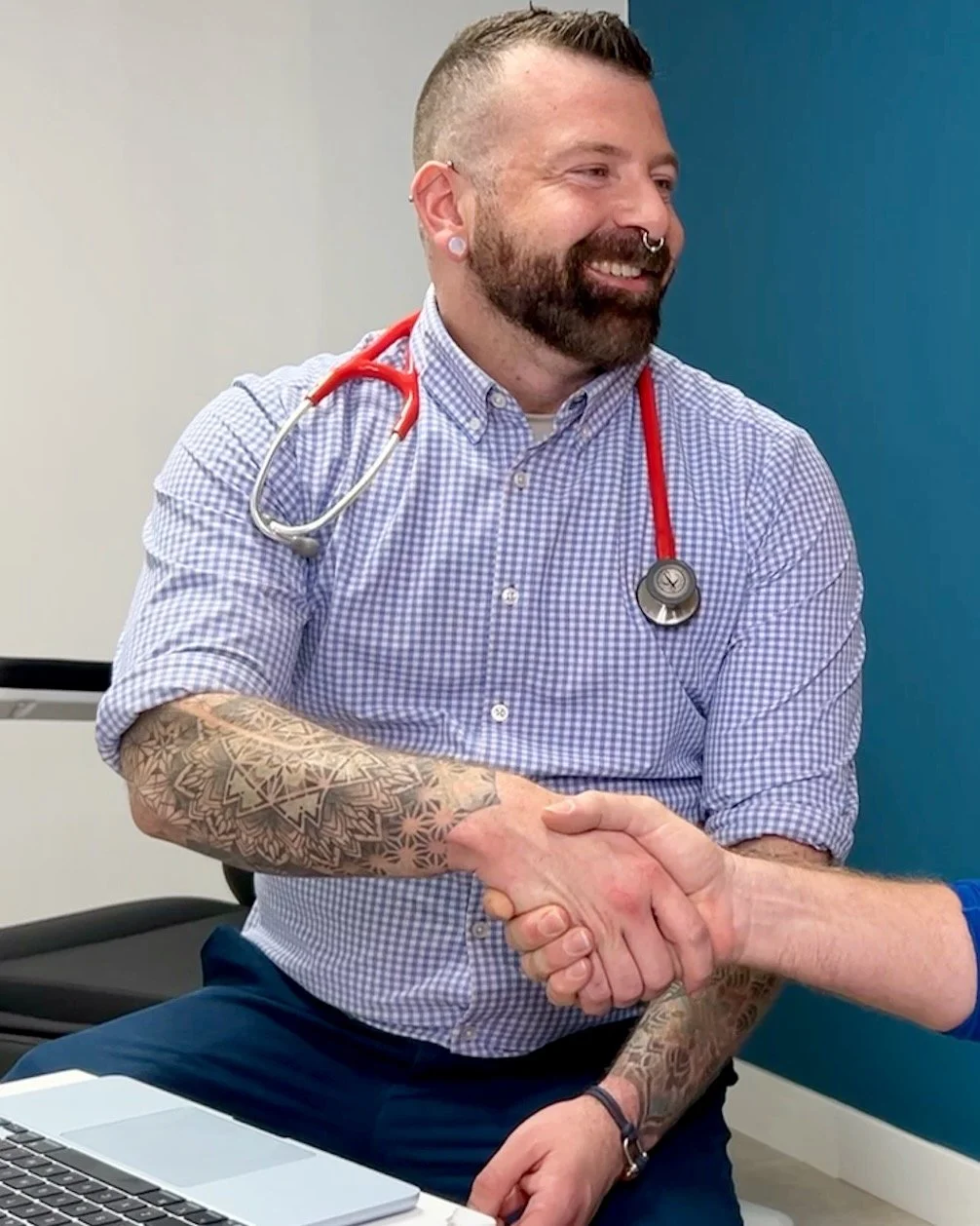 Primary care and mental health clinician wearing a stethoscope, representing accessible, patient-centered medical care for adults in Alaska and California.